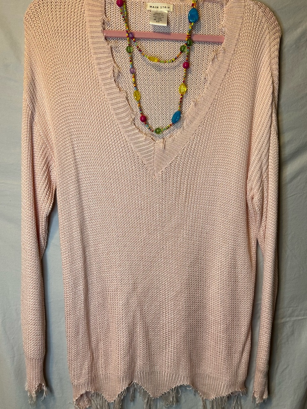 Main Strip Pale Pink V-Neck Knit Sweater with Distressed Hem
